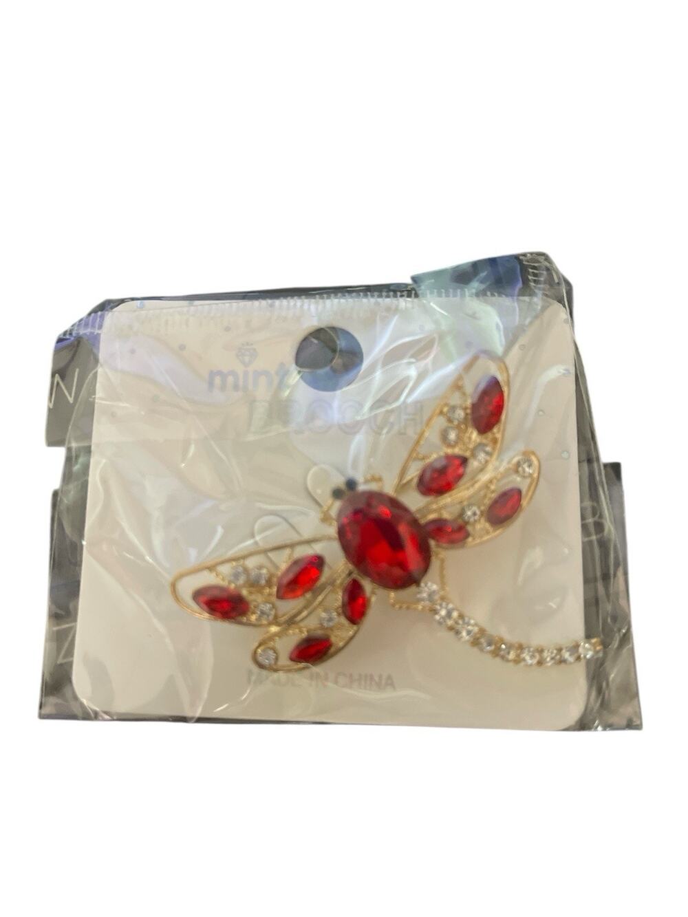 MINT GOLD DRAGONFLY WITH RED AND CLEAR STONES BROOCH